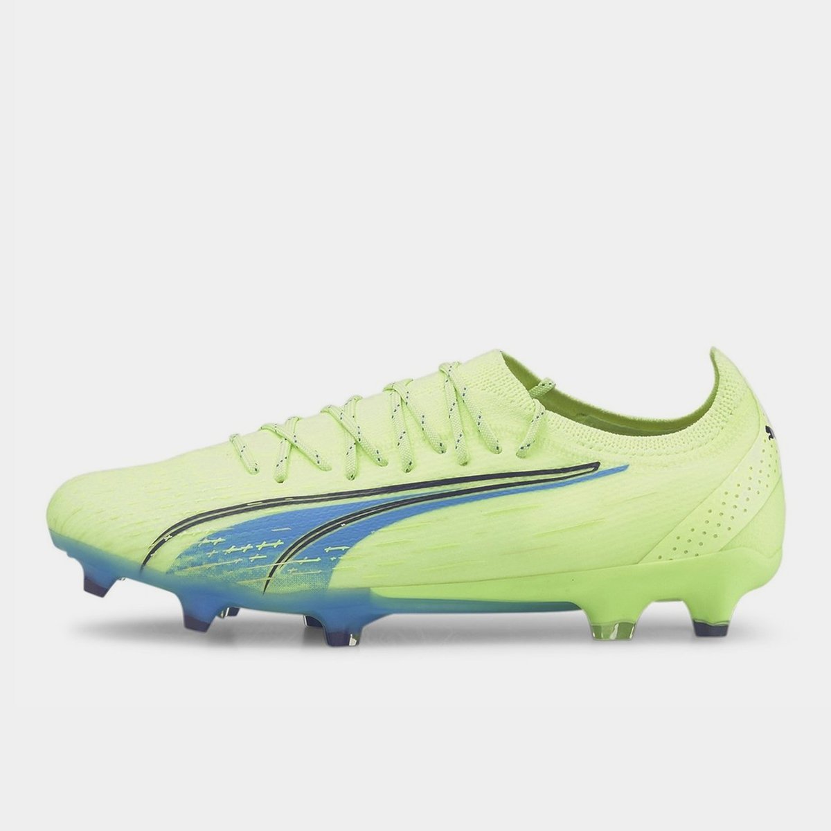 Puma green football store boots