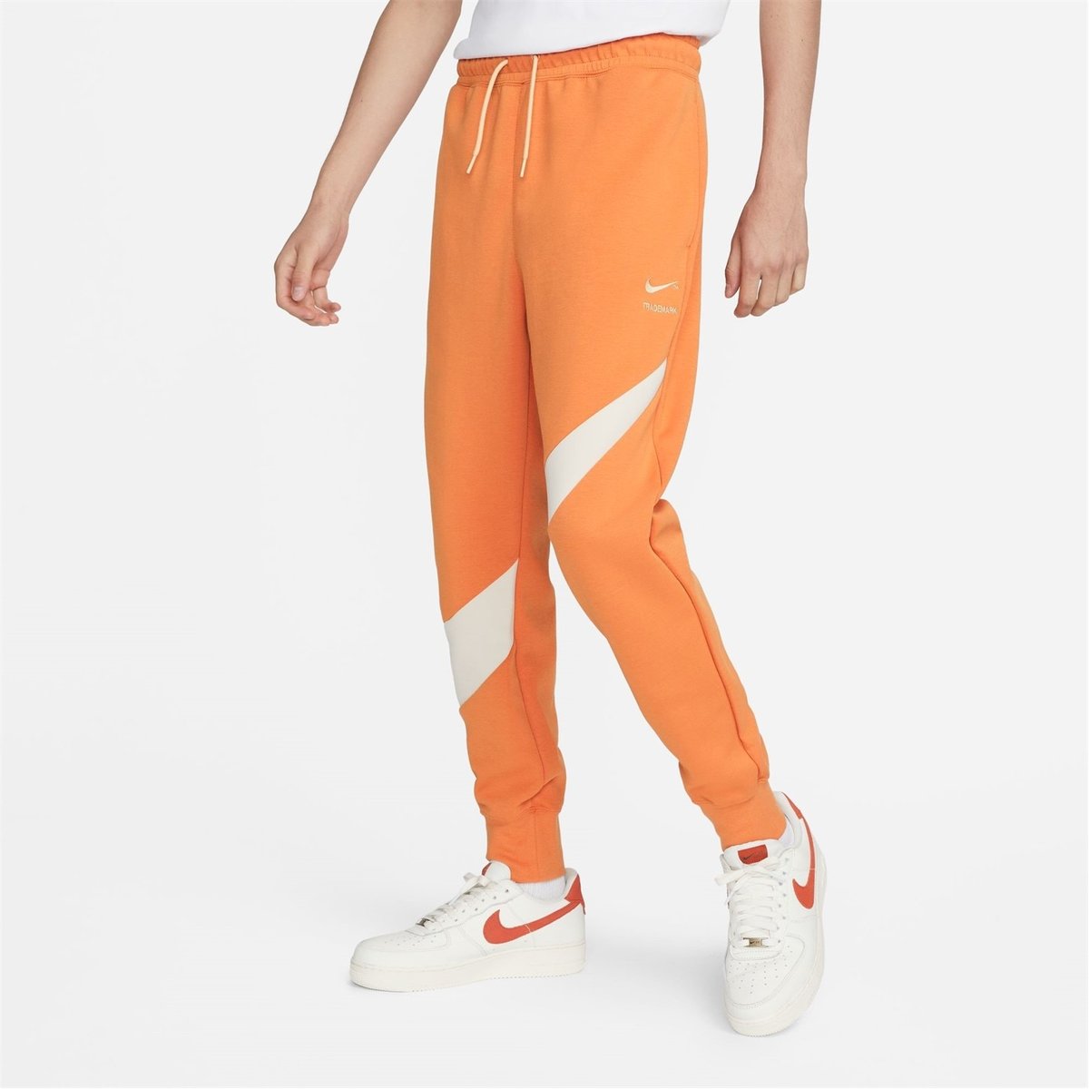 Orange nike 2025 jogging pants