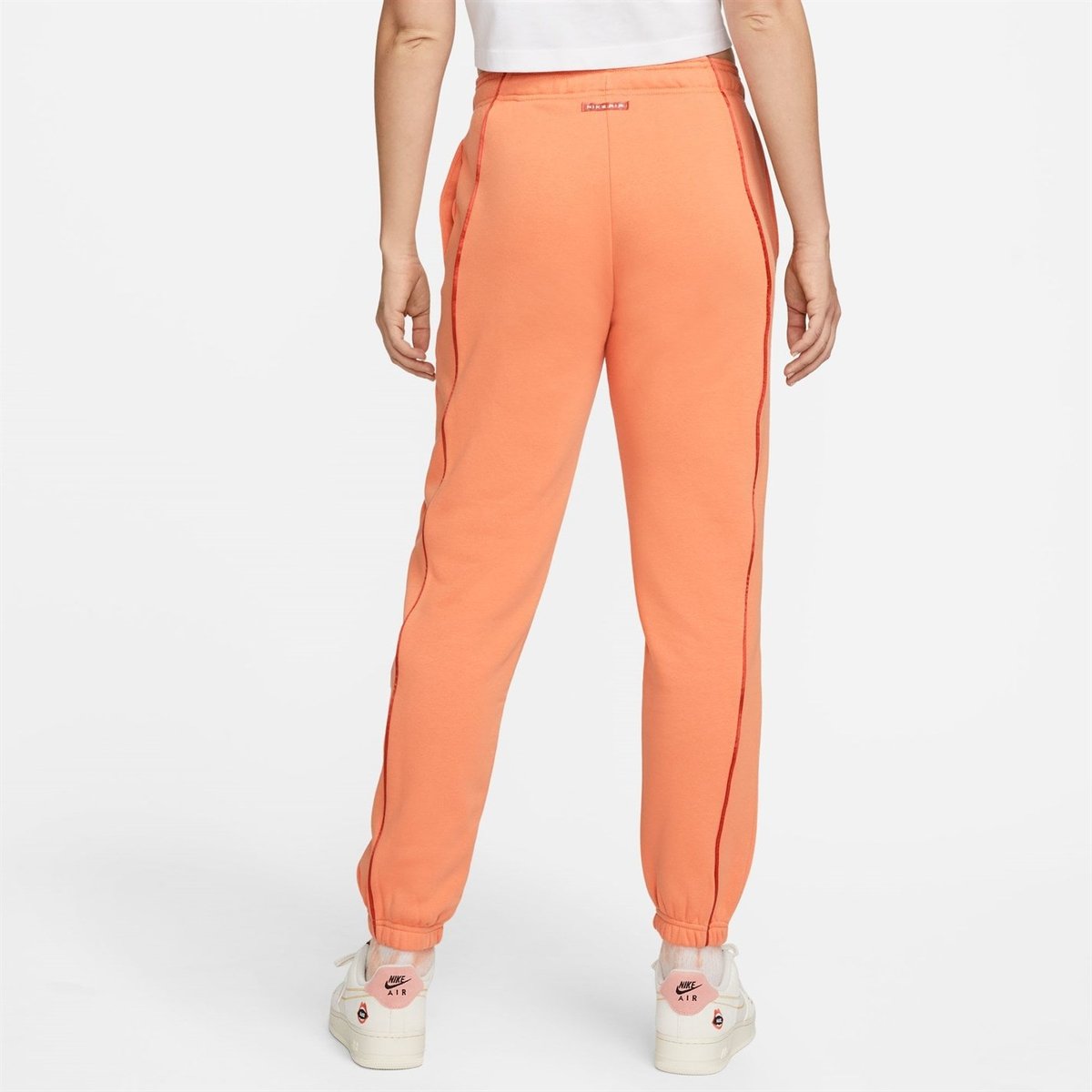 Orange nike jogging online pants