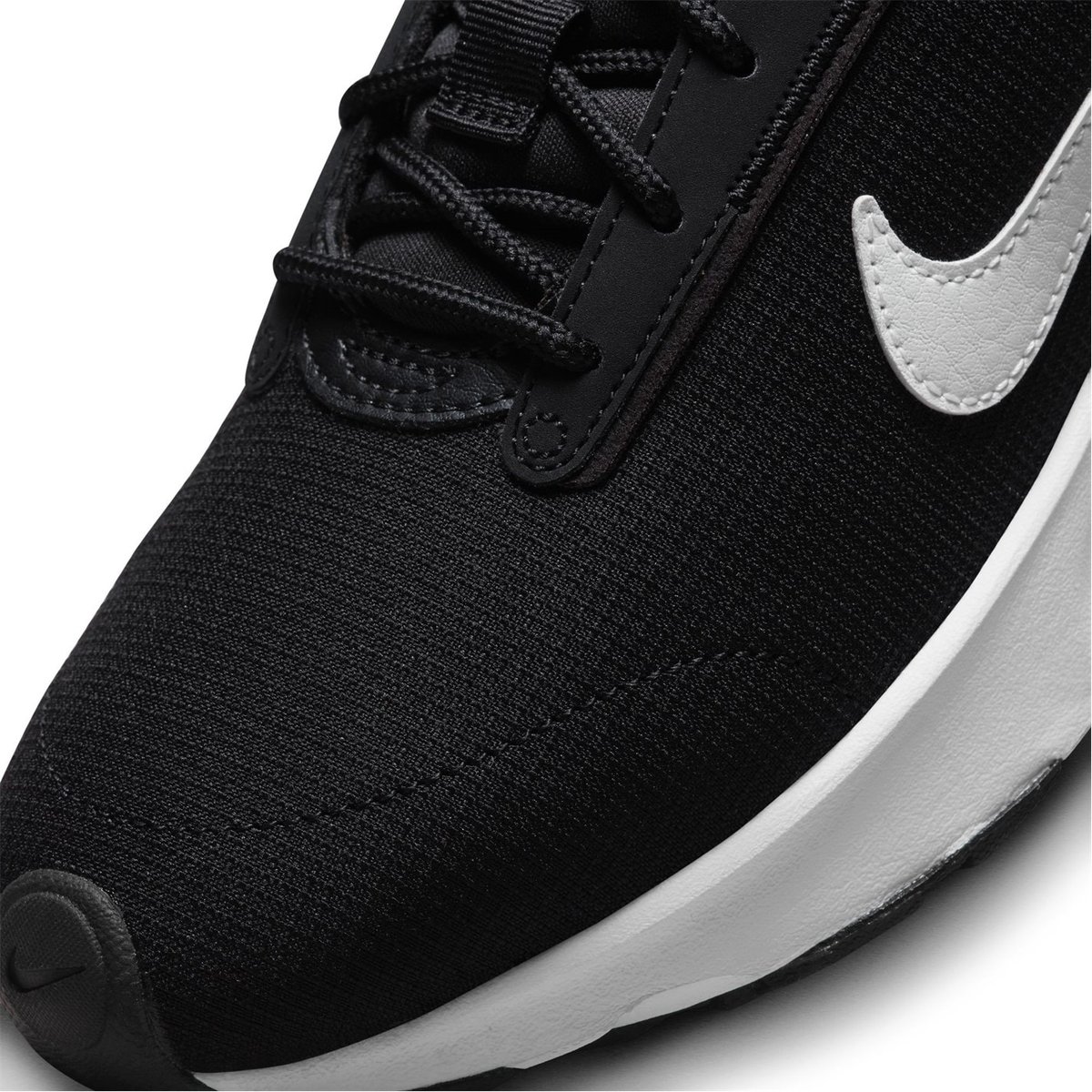 Nike thea black and deals white womens