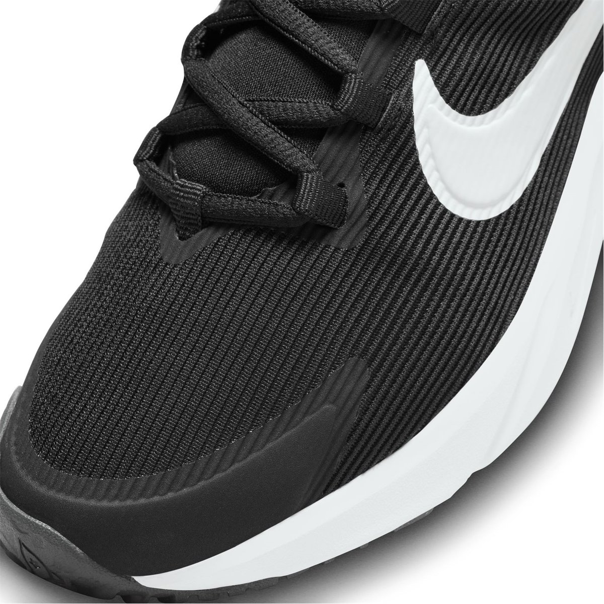 Black and best sale white nike runners