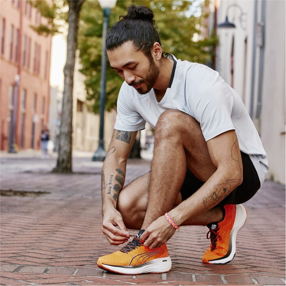 Orange puma shop running shoes