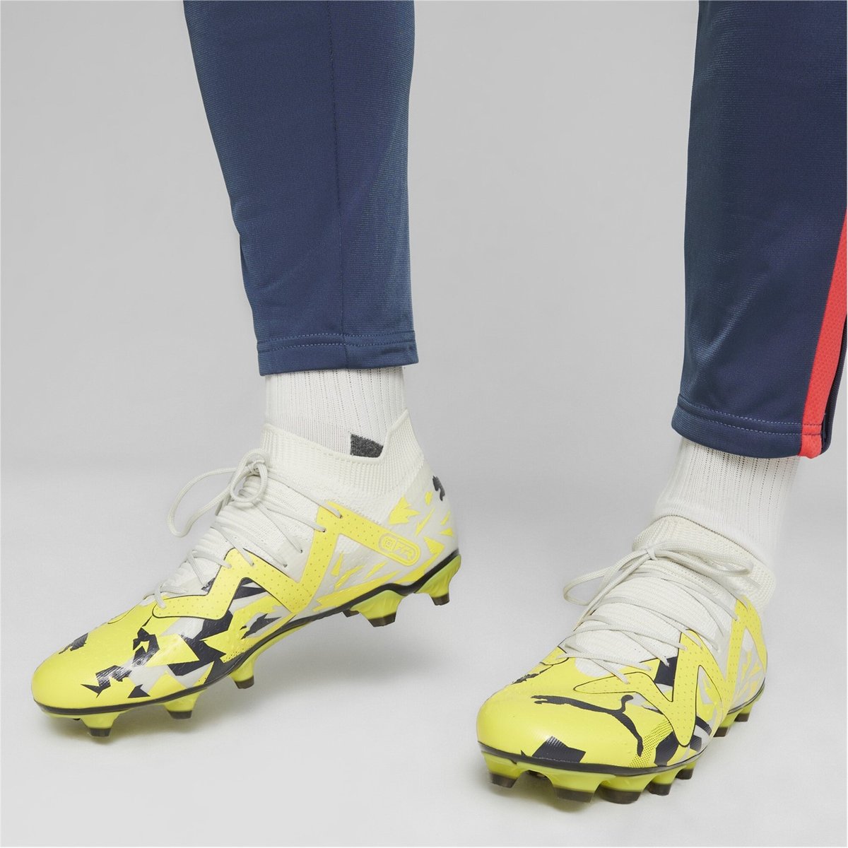 Grey and 2024 yellow football boots