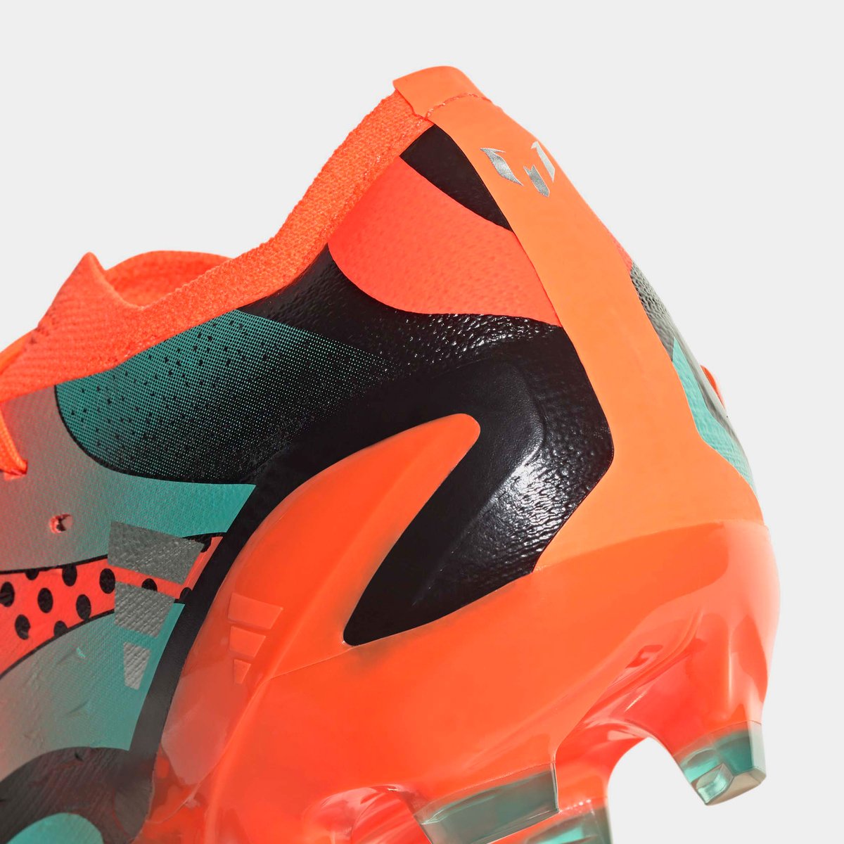 Orange and sale green football cleats