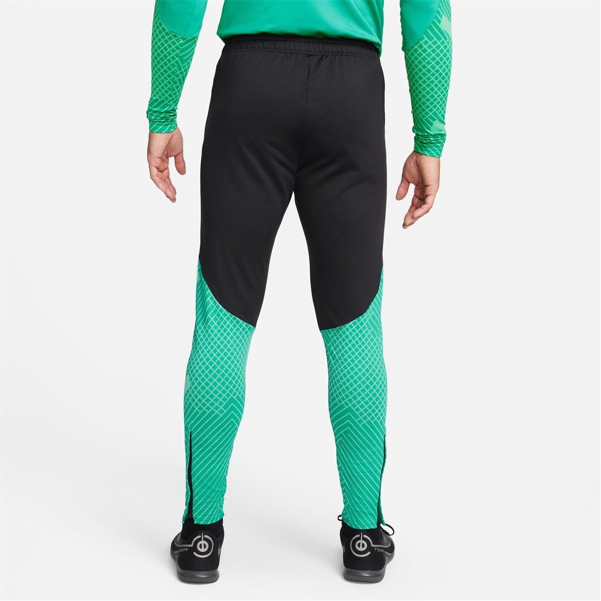 Black and green top soccer pants