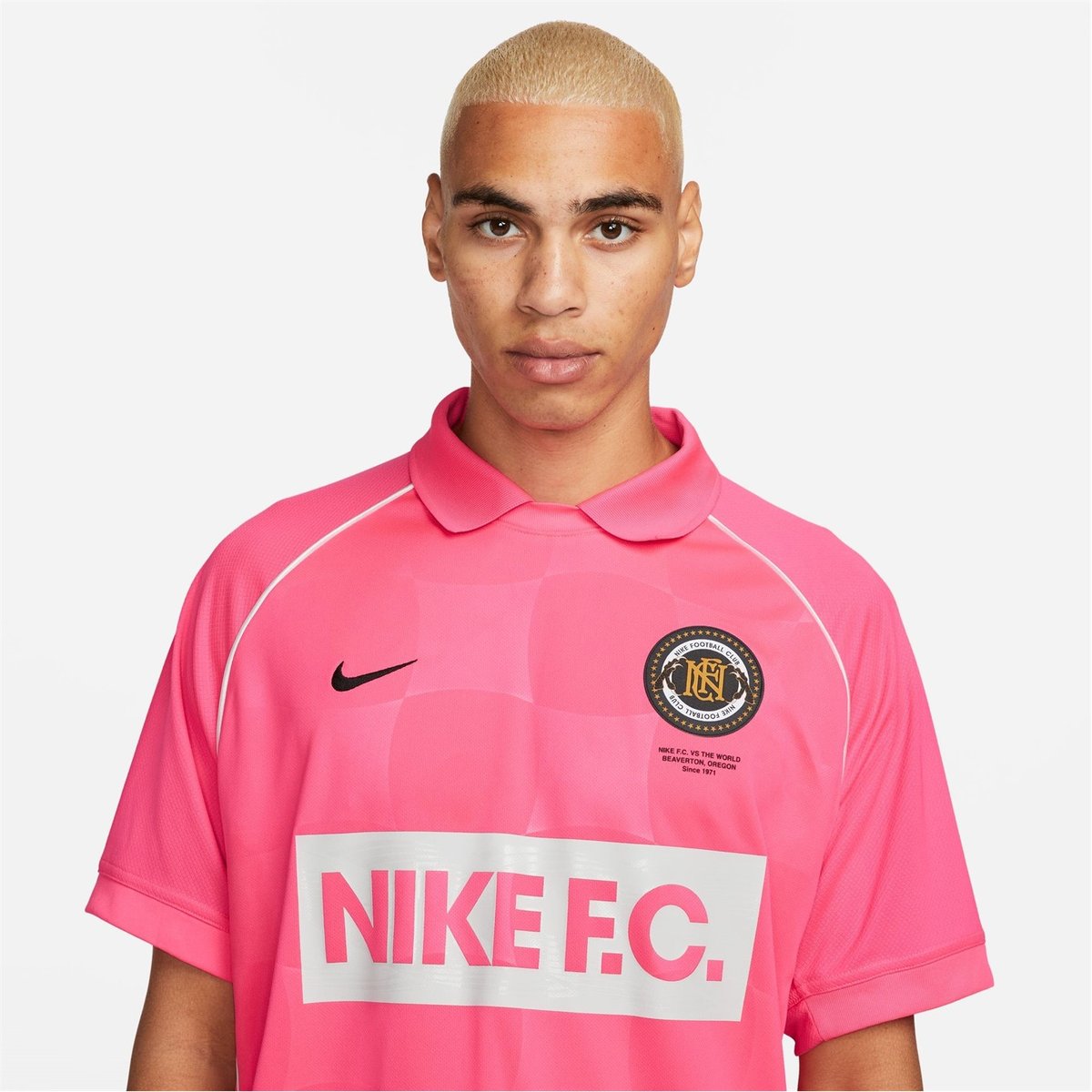 Pink nike store football shirt