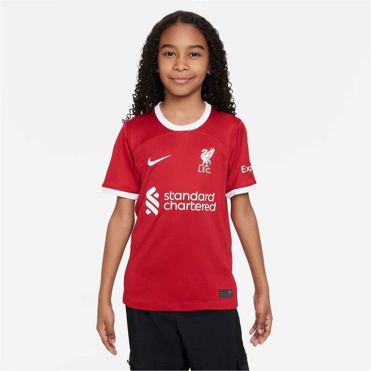 Girl wearing 2025 liverpool shirt