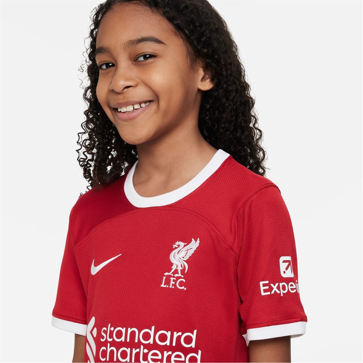 Girl in 2025 liverpool shirt