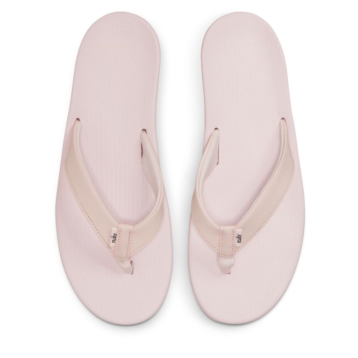 Rose gold hotsell nike flip flops