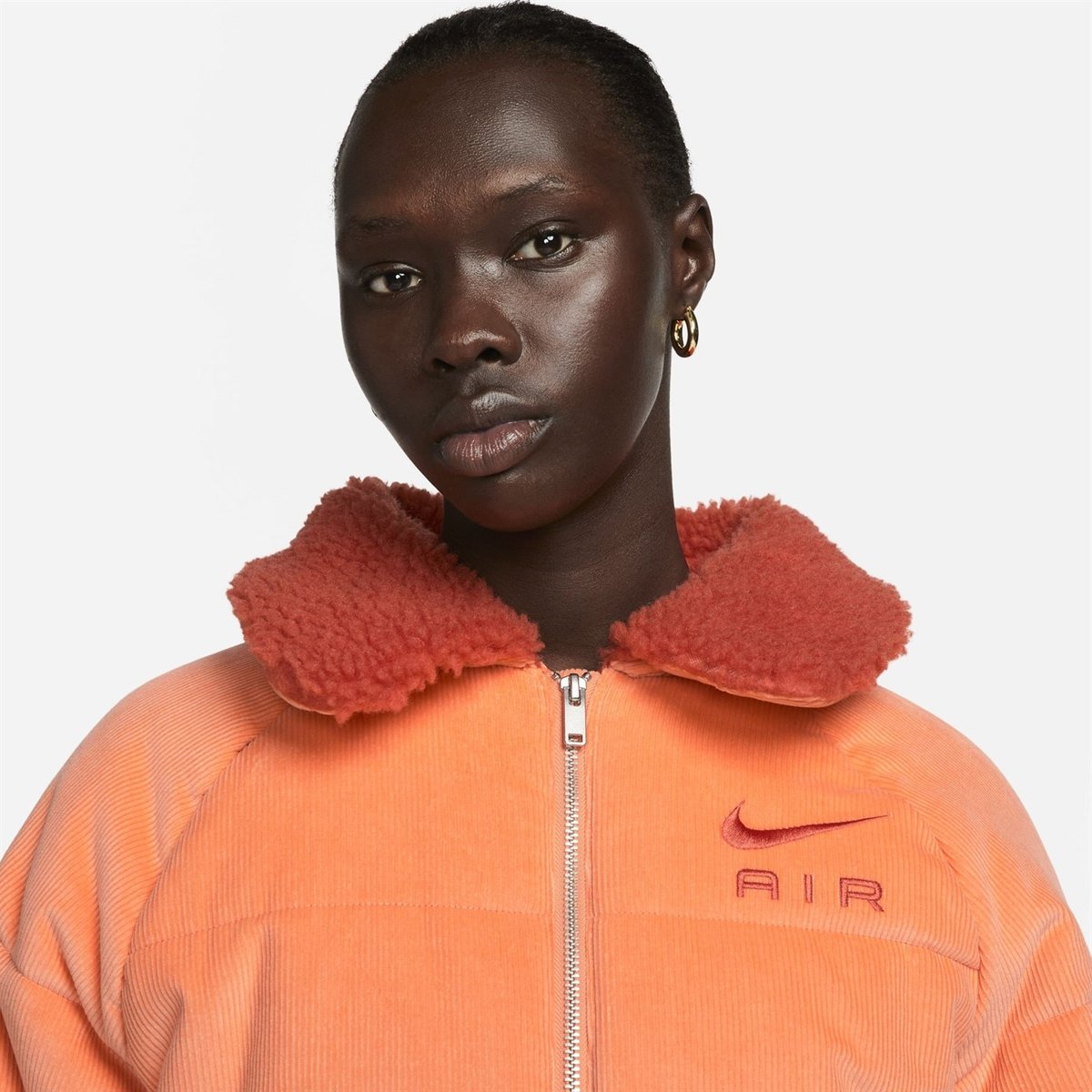 Orange best sale jacket nike