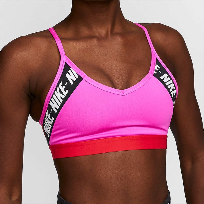 Nike Training Indy light support logo sports bra in pink